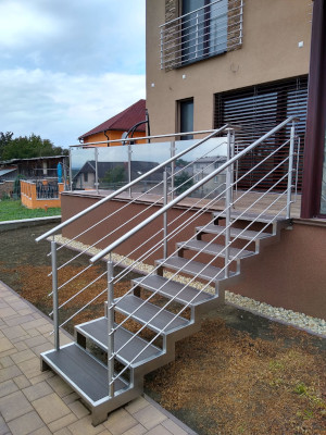 Stainless steel stairs, stainless steel railing with vertical and glass infill, stainless steel French door